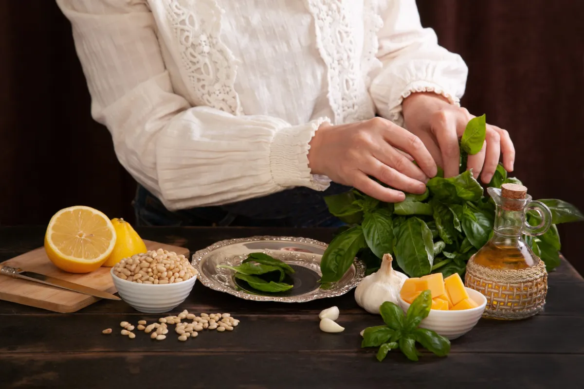 Fresh herbs, lemon, garlic, and natural ingredients representing the Ayurvedic diet and digestive balance