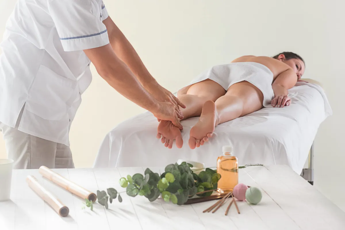 Ayurvedic foot and leg massage therapy supporting circulation, detoxification, and overall wellness